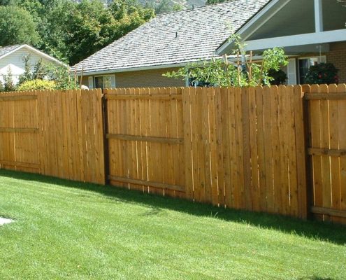 Stockade Fence with a Neighbor-friendly design