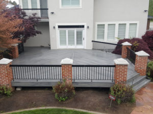 Trex Transcend Island Mist Deck with Brick Posts and IronGuard Railing