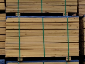 A stack of cedar pickets for wood fence sale