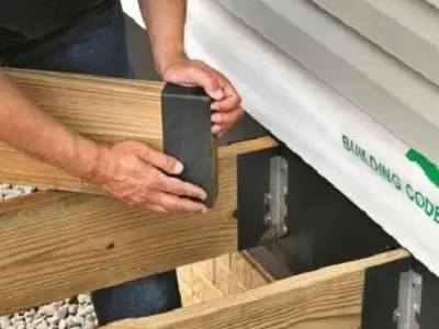 Protective membrane on ends of joists